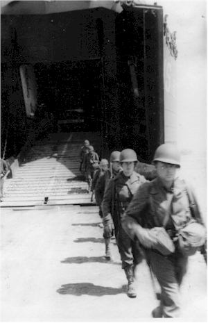LST50 unloading troops Operation Fabius.jpg